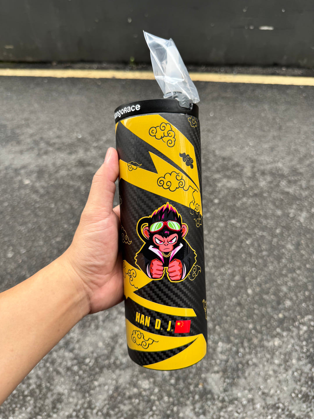 Yellow and black MangoRace custom bottle