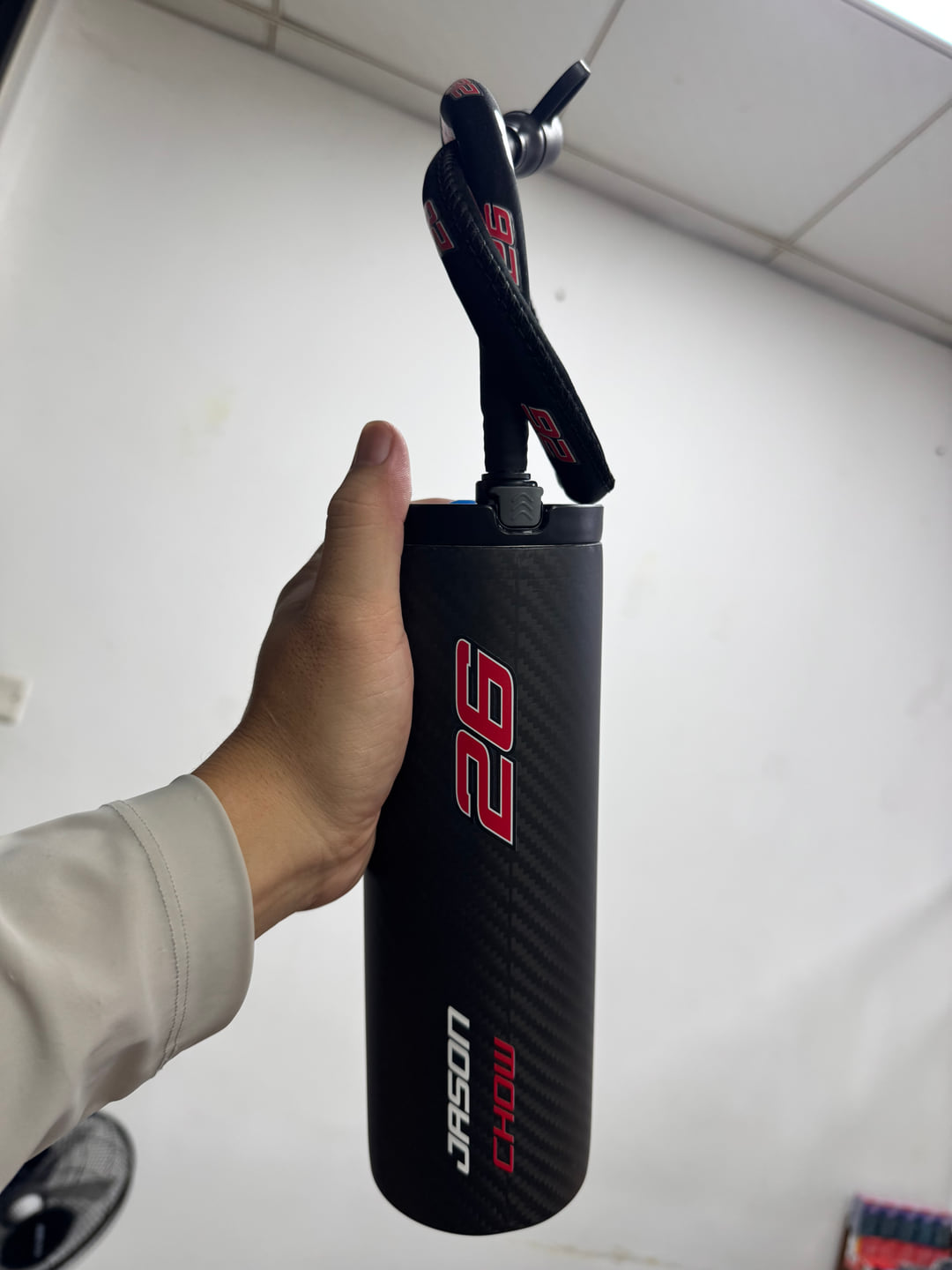 Black and red number 26 MangoRace custom bottle